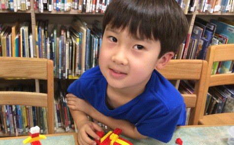 Robotics Engineering - Kid working on LEGO Robot